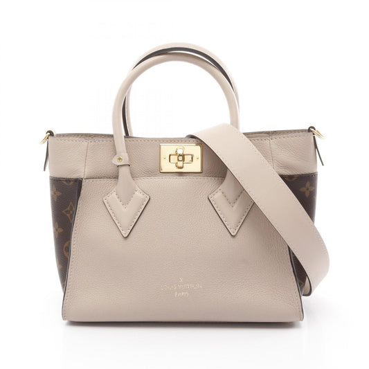 Louis Vuitton Monogram Leather PVC On My Side PM Handbag