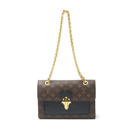 Louis Vuitton Victoire Monogram Leather Bag