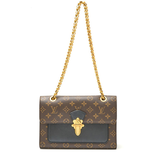 Louis Vuitton Victoire Monogram Leather Bag