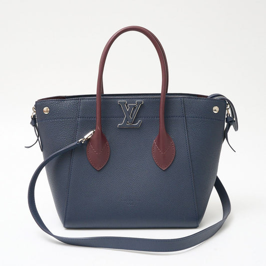 Louis Vuitton Freedom Handbag M54842