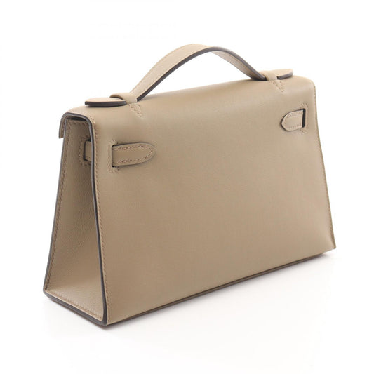 Hermes Pochette Kelly Mini Beige Handbag