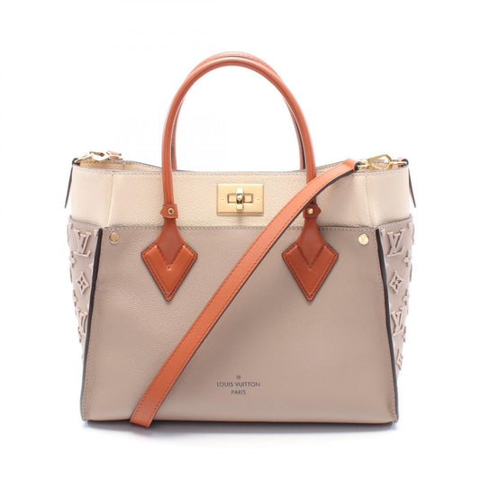 Louis Vuitton On My Side Leather Handbag M53825