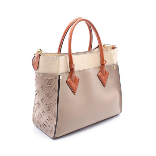 Louis Vuitton On My Side Leather Handbag M53825