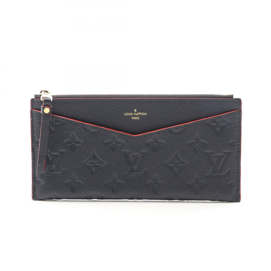 Louis Vuitton Monogram Empreinte Leather Pochette Melanie BB Clutch M68713